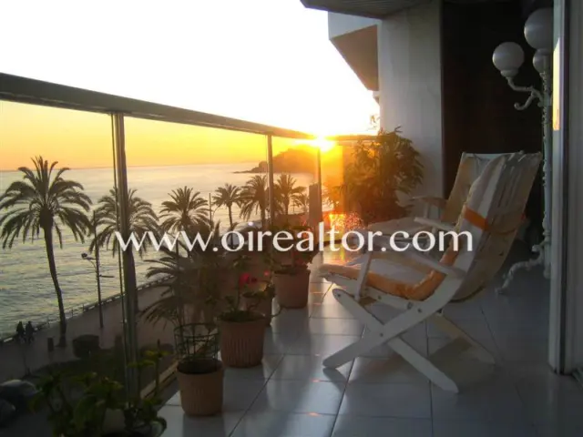 Luxury apartment for sale on the first line of the sea in Lloret de Mar. It has a surface area of 200 m2 and is distributed in a spacious and bright living-dining room with a large terrace and unforgettable views of the sea, four bedrooms, two en suite, master bedroom with open sea view, spacious kitchen fully equipped with MIELE design furniture. The flat has a large entrance hall and large living-dining room with fireplace and terrace with sea views. The bathrooms have 1st quality ceramic pieces and bathtubs. The property is equipped with the following qualities and finishes such as air conditioning with heat pump, all rooms are exterior with built-in wardrobes and marble floors. The exterior carpentry is aluminum with double “climalite” glass. It also has a reinforced door and alarm. The location is very privileged in a building of 6 floors, one apartment per floor with direct access to the elevator. All terraces offer wonderful clear views of the beach, the castle of Lloret de Mar, the San Joan tower and the seaside promenade. A selection to enjoy the beauty of the Coast and the atmosphere of the Mediterranean Lloret de Mar is a Spanish municipality in the Selva region, in the province of Girona, Catalonia and next to the sea, on the Costa Brava. It has excellent granulated sand beaches. It also has magnificent views of the castle at one end and at the other the monument to "La dona Marinera" which represents the suffering of women waiting for the return of their fishing husbands. Also places to visit such as: - Church of San Román: Gothic church with Renaissance influences built between 1509 and 1522. It presents some typical characteristics of a fortification, such as the drawbridge door. - Santa Clotilde Gardens: The Santa Clotilde Gardens, which were completed in 1919, are the work of builder Nicolau Maria Rubió i Tudurí.