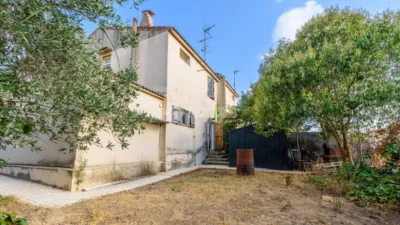 Terraced house on Carrer de les Corts Catalanes photo 2