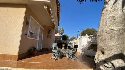 Casa adosada en venta en Calle Peña Vieja, 28, Las Filipinas-Villamartín-Canal Norte (Distrito Orihuela Costa. Orihuela) de 264.900 €