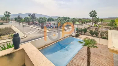 Chalet for sale in the Atalaya area of Huércal-Overa. Property built on a 560 m² plot with a constructed living area of 530 m². The house comprises 4 bedrooms (master bedroom with walk-in closet), 5 bathrooms (1 on the ground floor, 1 on the upper floor in each bedroom, 1 on the ground floor and 1 in the basement), 1 guest toilet in the exterior area, spacious separate lounge, fully furnished and equipped independent kitchen, large pantry, extensive laundry area, several terraces, and a basement with independent access and motorized doors capable of accommodating multiple cars. The property features high photo 42