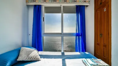 Duplex penthouse on the first line of La Fossa beach, 15th and 16th floors. Close to supermarkets and the urban bus stop. It has 150 square meters built, distributed in three bedrooms, three bathrooms, kitchen and living room with a 63-square-meter terrace with 360-degree views of all of Calpe. The apartment is located in a building with a community pool with direct access to the seaside promenade, social club and green areas where you can sunbathe or simply relax. photo 20
