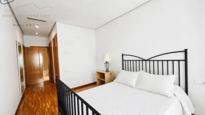 Ground floor apartment with two terraces, swimming pools, parking and storage room in La Bonanova. Living in La Bonanova means enjoying one of the most valued residential areas in Palma, combining tranquility, good transport links and proximity to all amenities. In this privileged setting we find this attractive ground floor apartment with two bedrooms and two terraces, located in a well-kept high-end residential complex. The property stands out for its outdoor spaces, its good layout and the quality of its finishes, making it an excellent option both as a main residence and as a second home in Mallorca. The interior is arranged with two bedrooms, both with direct access to the terrace, and two bathrooms. It also features built-in wardrobes and parquet flooring, adding warmth and functionality to the different rooms. The living room connects to the kitchen, creating a comfortable and practical day zone, and the apartment also includes a separate laundry area. One of its main attractions is its two private terraces. The terrace connected directly to the living room offers space for an outdoor dining area, perfect for enjoying dinners, gatherings with friends or simply relaxing outdoors. From here you can even admire the characteristic silhouette of Bellver Castle, adding special appeal to the surroundings. The property also has a second terrace, connected to the ground floor, considerably expanding the possibilities for enjoying the outdoors for much of the year. The residential complex offers well-maintained communal areas with two large swimming pools, perfectly kept gardens, rest areas with benches and various spaces designed to enjoy the environment and leisure time with family. The apartment also includes a parking space and storage room, two particularly practical and valued features in this area of Palma. La Bonanova is one of the residential areas with the highest demand in the city thanks to its tranquility, excellent location and quick connections to the main access routes to Palma. Its proximity to Queens College is also noteworthy, making this location especially interesting for families and international buyers looking to establish their residence near an international school. A property particularly suited for those seeking quality of life, outdoor spaces, communal areas and a privileged location in Palma de Mallorca, whether as a main residence or second home. Contact us for more information and to view this property and its terraces in person in one of the most attractive areas of La Bonanova. The price includes the agency fees, payable by the seller. It does not include taxes or purchase costs — ITP or VAT/AJD, notary and registration — which will be borne by the buyer. Their amount will depend on the value of the transaction and the personal circumstances of the purchaser. photo 20