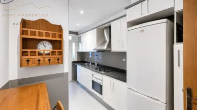 Ground floor apartment with two terraces, swimming pools, parking and storage room in La Bonanova. Living in La Bonanova means enjoying one of the most valued residential areas in Palma, combining tranquility, good transport links and proximity to all amenities. In this privileged setting we find this attractive ground floor apartment with two bedrooms and two terraces, located in a well-kept high-end residential complex. The property stands out for its outdoor spaces, its good layout and the quality of its finishes, making it an excellent option both as a main residence and as a second home in Mallorca. The interior is arranged with two bedrooms, both with direct access to the terrace, and two bathrooms. It also features built-in wardrobes and parquet flooring, adding warmth and functionality to the different rooms. The living room connects to the kitchen, creating a comfortable and practical day zone, and the apartment also includes a separate laundry area. One of its main attractions is its two private terraces. The terrace connected directly to the living room offers space for an outdoor dining area, perfect for enjoying dinners, gatherings with friends or simply relaxing outdoors. From here you can even admire the characteristic silhouette of Bellver Castle, adding special appeal to the surroundings. The property also has a second terrace, connected to the ground floor, considerably expanding the possibilities for enjoying the outdoors for much of the year. The residential complex offers well-maintained communal areas with two large swimming pools, perfectly kept gardens, rest areas with benches and various spaces designed to enjoy the environment and leisure time with family. The apartment also includes a parking space and storage room, two particularly practical and valued features in this area of Palma. La Bonanova is one of the residential areas with the highest demand in the city thanks to its tranquility, excellent location and quick connections to the main access routes to Palma. Its proximity to Queens College is also noteworthy, making this location especially interesting for families and international buyers looking to establish their residence near an international school. A property particularly suited for those seeking quality of life, outdoor spaces, communal areas and a privileged location in Palma de Mallorca, whether as a main residence or second home. Contact us for more information and to view this property and its terraces in person in one of the most attractive areas of La Bonanova. The price includes the agency fees, payable by the seller. It does not include taxes or purchase costs — ITP or VAT/AJD, notary and registration — which will be borne by the buyer. Their amount will depend on the value of the transaction and the personal circumstances of the purchaser. photo 11