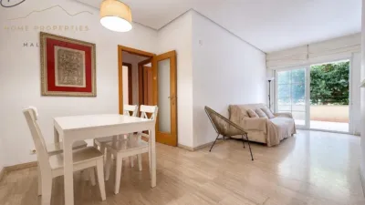 Ground floor apartment with two terraces, swimming pools, parking and storage room in La Bonanova. Living in La Bonanova means enjoying one of the most valued residential areas in Palma, combining tranquility, good transport links and proximity to all amenities. In this privileged setting we find this attractive ground floor apartment with two bedrooms and two terraces, located in a well-kept high-end residential complex. The property stands out for its outdoor spaces, its good layout and the quality of its finishes, making it an excellent option both as a main residence and as a second home in Mallorca. The interior is arranged with two bedrooms, both with direct access to the terrace, and two bathrooms. It also features built-in wardrobes and parquet flooring, adding warmth and functionality to the different rooms. The living room connects to the kitchen, creating a comfortable and practical day zone, and the apartment also includes a separate laundry area. One of its main attractions is its two private terraces. The terrace connected directly to the living room offers space for an outdoor dining area, perfect for enjoying dinners, gatherings with friends or simply relaxing outdoors. From here you can even admire the characteristic silhouette of Bellver Castle, adding special appeal to the surroundings. The property also has a second terrace, connected to the ground floor, considerably expanding the possibilities for enjoying the outdoors for much of the year. The residential complex offers well-maintained communal areas with two large swimming pools, perfectly kept gardens, rest areas with benches and various spaces designed to enjoy the environment and leisure time with family. The apartment also includes a parking space and storage room, two particularly practical and valued features in this area of Palma. La Bonanova is one of the residential areas with the highest demand in the city thanks to its tranquility, excellent location and quick connections to the main access routes to Palma. Its proximity to Queens College is also noteworthy, making this location especially interesting for families and international buyers looking to establish their residence near an international school. A property particularly suited for those seeking quality of life, outdoor spaces, communal areas and a privileged location in Palma de Mallorca, whether as a main residence or second home. Contact us for more information and to view this property and its terraces in person in one of the most attractive areas of La Bonanova. The price includes the agency fees, payable by the seller. It does not include taxes or purchase costs — ITP or VAT/AJD, notary and registration — which will be borne by the buyer. Their amount will depend on the value of the transaction and the personal circumstances of the purchaser. photo 4