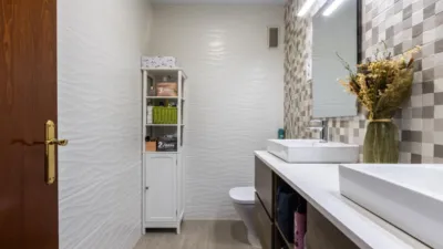 Apialia Sabadell presents this spacious and bright apartment by builder Mañero, located in one of the most established and attractive areas of Gràcia, surrounded by shops, services, schools, and public transport. The property is in a building with lift access and includes a parking space and storage room in the price, adding significant value to the location. The layout is comfortable and functional, featuring 3 bedrooms: two doubles and one single. It has a full en-suite bathroom and a modern design powder room with a double sink, which was previously a full bathroom. The daytime area comprises a large, bright living-dining room with direct access to a balcony offering clear views, perfect for enjoying natural light and the outdoors. The fully independent kitchen is clearly separated from the living area, providing a practical and contemporary space. An excellent opportunity for those seeking space, light, a good layout, and all amenities, including parking and storage, in a privileged location in Gràcia. Property condition: Ready to move in. Useful area: 105 m Built-up area: 135 m2 AICAT No.: A14038 API No.: 8304 Pressurized Zone: YES Large Holder Status: NO In accordance with Article 20.1.c) of TRLGDCU and Royal Decree 515/1989, the advertised price does not include taxes or transaction costs unless expressly stated. If the transaction is subject to VAT, the current rate under Law 37/1992 will apply, along with AJD where applicable. If subject to ITP, it will be settled in accordance with Legislative Royal Decree 1/1993 and current tax regulations in Catalonia. Notary and registration fees will be paid according to the tariff, in line with the relevant Royal Decrees. The buyer will not assume expenses legally attributable to the seller. ENERGY LABEL: 5590026DF2959H0027SJ photo 35