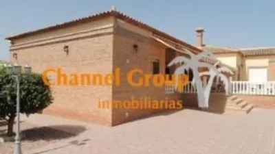 Casa – Dolores, Polígono Industrial Los Corrales - Més