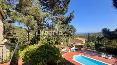 Apialia offers this fantastic rustic property with sea views, located on a plot of nearly 6,000 m² in Lloret de Mar, just 10 minutes by car from the beach. Surrounded by nature and offering total privacy, this home provides a unique setting with open views of the sea and hills, for those seeking tranquility without sacrificing proximity to the coast. The house is in perfect condition, with 214 m² built across two floors. It features four double bedrooms, all equipped with air conditioning and fitted wardrobes, and two full bathrooms. photo 23