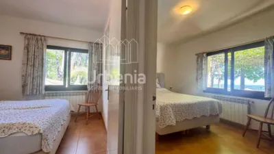 Apialia offers this fantastic rustic property with sea views, located on a plot of nearly 6,000 m² in Lloret de Mar, just 10 minutes by car from the beach. Surrounded by nature and offering total privacy, this home provides a unique setting with open views of the sea and hills, for those seeking tranquility without sacrificing proximity to the coast. The house is in perfect condition, with 214 m² built across two floors. It features four double bedrooms, all equipped with air conditioning and fitted wardrobes, and two full bathrooms. photo 17
