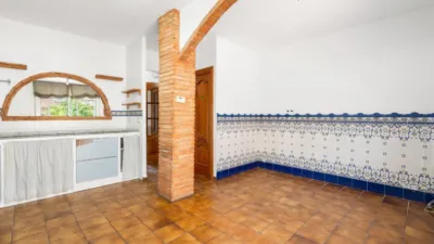 Detached house with garden and pool for sale in La Palma de Cervelló. The ground floor features a garage and laundry room. The first floor comprises the living-dining room, an extended open-plan kitchen, access to the rear terrace, and direct access to the garden barbecue area. The upper floor is arranged into 3 bedrooms (1 double with solarium, 1 double, 1 single), a bathroom with shower, air conditioning/heating in the living-dining room, and air conditioning in the upper floor hallway. Features include ceramic flooring, wooden railings, natural gas heating, aluminium windows, and wooden interior doors. Located close to essential amenities: nursery school, public school, library, supermarkets, restaurants, pharmacy, sports facilities, playgrounds, easy access to mountains for hiking, public bus transport, 19 km from Barcelona. API Number: A12369, Registration Number: 9526 photo 6