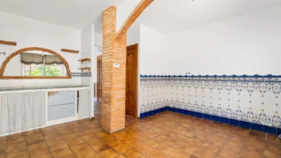 Detached house with garden and pool for sale in La Palma de Cervelló. The ground floor features a garage and laundry room. The first floor comprises the living-dining room, an extended open-plan kitchen, access to the rear terrace, and direct access to the garden barbecue area. The upper floor is arranged into 3 bedrooms (1 double with solarium, 1 double, 1 single), a bathroom with shower, air conditioning/heating in the living-dining room, and air conditioning in the upper floor hallway. Features include ceramic flooring, wooden railings, natural gas heating, aluminium windows, and wooden interior doors. Located close to essential amenities: nursery school, public school, library, supermarkets, restaurants, pharmacy, sports facilities, playgrounds, easy access to mountains for hiking, public bus transport, 19 km from Barcelona. API Number: A12369, Registration Number: 9526 photo 7