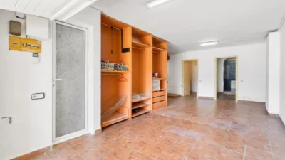 Detached house with garden and pool for sale in La Palma de Cervelló. The ground floor features a garage and laundry room. The first floor comprises the living-dining room, an extended open-plan kitchen, access to the rear terrace, and direct access to the garden barbecue area. The upper floor is arranged into 3 bedrooms (1 double with solarium, 1 double, 1 single), a bathroom with shower, air conditioning/heating in the living-dining room, and air conditioning in the upper floor hallway. Features include ceramic flooring, wooden railings, natural gas heating, aluminium windows, and wooden interior doors. Located close to essential amenities: nursery school, public school, library, supermarkets, restaurants, pharmacy, sports facilities, playgrounds, easy access to mountains for hiking, public bus transport, 19 km from Barcelona. API Number: A12369, Registration Number: 9526 photo 22