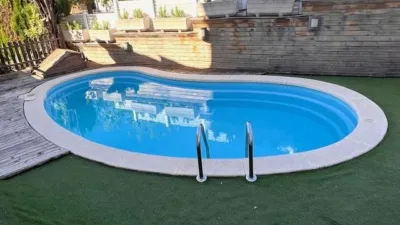 Detached house with garden and pool for sale in La Palma de Cervelló. The ground floor features a garage and laundry room. The first floor comprises the living-dining room, an extended open-plan kitchen, access to the rear terrace, and direct access to the garden barbecue area. The upper floor is arranged into 3 bedrooms (1 double with solarium, 1 double, 1 single), a bathroom with shower, air conditioning/heating in the living-dining room, and air conditioning in the upper floor hallway. Features include ceramic flooring, wooden railings, natural gas heating, aluminium windows, and wooden interior doors. Located close to essential amenities: nursery school, public school, library, supermarkets, restaurants, pharmacy, sports facilities, playgrounds, easy access to mountains for hiking, public bus transport, 19 km from Barcelona. API Number: A12369, Registration Number: 9526 photo 30