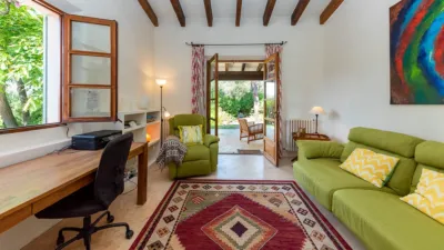 Luxury rural finca in one of Pollença’s most sought-after areas. Built in 2003, this property sits on a plot of 53,600m² with approximately 540m² of built space. The main house features a bedroom on the ground floor, a living room with a fireplace, a separate dining room, and a large kitchen with a pantry and laundry room, all overlooking the garden. Access to the garage, which can accommodate two large cars, is also on this level. photo 13