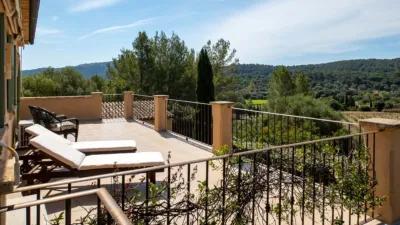 Luxury rural finca in one of Pollença’s most sought-after areas. Built in 2003, this property sits on a plot of 53,600m² with approximately 540m² of built space. The main house features a bedroom on the ground floor, a living room with a fireplace, a separate dining room, and a large kitchen with a pantry and laundry room, all overlooking the garden. Access to the garage, which can accommodate two large cars, is also on this level. photo 17