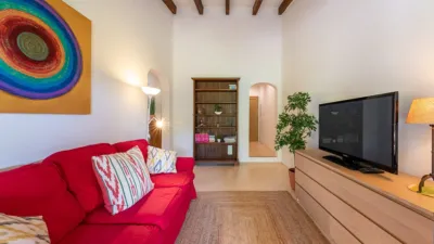 Luxury rural finca in one of Pollença’s most sought-after areas. Built in 2003, this property sits on a plot of 53,600m² with approximately 540m² of built space. The main house features a bedroom on the ground floor, a living room with a fireplace, a separate dining room, and a large kitchen with a pantry and laundry room, all overlooking the garden. Access to the garage, which can accommodate two large cars, is also on this level. photo 27