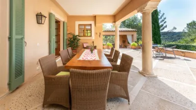 Luxury rural finca in one of Pollença’s most sought-after areas. Built in 2003, this property sits on a plot of 53,600m² with approximately 540m² of built space. The main house features a bedroom on the ground floor, a living room with a fireplace, a separate dining room, and a large kitchen with a pantry and laundry room, all overlooking the garden. Access to the garage, which can accommodate two large cars, is also on this level. photo 29