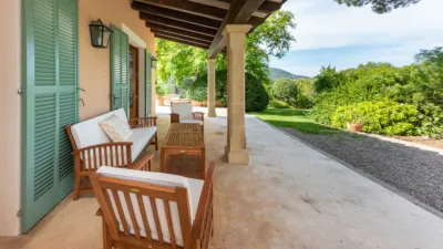 Luxury rural finca in one of Pollença’s most sought-after areas. Built in 2003, this property sits on a plot of 53,600m² with approximately 540m² of built space. The main house features a bedroom on the ground floor, a living room with a fireplace, a separate dining room, and a large kitchen with a pantry and laundry room, all overlooking the garden. Access to the garage, which can accommodate two large cars, is also on this level. photo 32