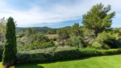 Luxury rural finca in one of Pollença’s most sought-after areas. Built in 2003, this property sits on a plot of 53,600m² with approximately 540m² of built space. The main house features a bedroom on the ground floor, a living room with a fireplace, a separate dining room, and a large kitchen with a pantry and laundry room, all overlooking the garden. Access to the garage, which can accommodate two large cars, is also on this level. photo 38