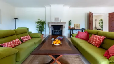 Luxury rural finca in one of Pollença’s most sought-after areas. Built in 2003, this property sits on a plot of 53,600m² with approximately 540m² of built space. The main house features a bedroom on the ground floor, a living room with a fireplace, a separate dining room, and a large kitchen with a pantry and laundry room, all overlooking the garden. Access to the garage, which can accommodate two large cars, is also on this level. photo 8