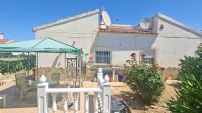 Villa for sale in Los Carrascos, Arboleas. A spacious 3-bedroom villa located in the highly sought-after area of Los Carrascos, Arboleas, offering privacy, generous outdoor areas and a peaceful setting. The property is fully enclosed with a gated entrance. Situated on a quiet side street, it borders an open plot. The house comprises 3 bedrooms, one with an en-suite bathroom, and air conditioning installed in 5 rooms. It features a large living room with a fireplace, a separate dining area, and a fully equipped kitchen. A spacious enclosed external terrace provides additional space for relaxation and entertaining, opening directly onto the pool area. At the rear, there is a large terrace adjacent to the swimming pool, complete with an outdoor shower. To the front, another terrace benefits from a pergola, while the side of the house includes a private, walled garden with mature flowers. There is also a garden storage room. In the front of the property, a driveway offers parking space for one car. The villa is sold unfurnished, although the owner is willing to negotiate on furniture if required. The property requires some improvements and redecoration, though these are purely cosmetic. The owner is open to offers, making this an excellent opportunity for those looking to personalise and adapt a villa to their taste. A lovely home in a tranquil location, featuring a private pool, expansive terraces and plenty of potential. photo 29