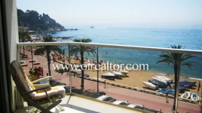 Luxury apartment for sale on the first line of the sea in Lloret de Mar. It has a surface area of 200 m2 and is distributed in a spacious and bright living-dining room with a large terrace and unforgettable views of the sea, four bedrooms, two en suite, master bedroom with open sea view, spacious kitchen fully equipped with MIELE design furniture. The flat has a large entrance hall and large living-dining room with fireplace and terrace with sea views. The bathrooms have 1st quality ceramic pieces and bathtubs. The property is equipped with the following qualities and finishes such as air conditioning with heat pump, all rooms are exterior with built-in wardrobes and marble floors. The exterior carpentry is aluminum with double “climalite” glass. It also has a reinforced door and alarm. The location is very privileged in a building of 6 floors, one apartment per floor with direct access to the elevator. All terraces offer wonderful clear views of the beach, the castle of Lloret de Mar, the San Joan tower and the seaside promenade. A selection to enjoy the beauty of the Coast and the atmosphere of the Mediterranean Lloret de Mar is a Spanish municipality in the Selva region, in the province of Girona, Catalonia and next to the sea, on the Costa Brava. It has excellent granulated sand beaches. It also has magnificent views of the castle at one end and at the other the monument to "La dona Marinera" which represents the suffering of women waiting for the return of their fishing husbands. Also places to visit such as: - Church of San Román: Gothic church with Renaissance influences built between 1509 and 1522. It presents some typical characteristics of a fortification, such as the drawbridge door. - Santa Clotilde Gardens: The Santa Clotilde Gardens, which were completed in 1919, are the work of builder Nicolau Maria Rubió i Tudurí. photo 7