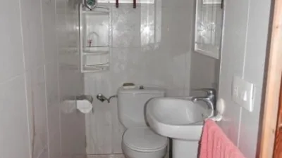 House for sale on Avenida Virgen de Gracia, Caudete (Albacete). A property with great potential in the town centre, featuring a 134m² plot and 297m² of built area. It comprises 6 bedrooms, kitchen, 2 living rooms, 3 bathrooms, patio, terrace, and a spacious garage. The house is arranged over two floors plus an attic. Price negotiable. Send us your offer. No commission for buyers. We finance purchases; please consult us. photo 15