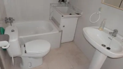House for sale on Avenida Virgen de Gracia, Caudete (Albacete). A property with great potential in the town centre, featuring a 134m² plot and 297m² of built area. It comprises 6 bedrooms, kitchen, 2 living rooms, 3 bathrooms, patio, terrace, and a spacious garage. The house is arranged over two floors plus an attic. Price negotiable. Send us your offer. No commission for buyers. We finance purchases; please consult us. photo 16