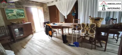 Stone house with 2 floors in Linares, (Brion). The ground floor is used as a cellar or stables. The upper floor has a wood-burning kitchen, living room, dining room, bathroom and bedroom. Uralite roof with iron beams and wooden panels. Very quiet area. It has a granary, cellar and land. 3 km from San Felipe Castle and Cariño beach, and 10 km from Ferrol. Storage room. The sale price does not include taxes (ITP/AJD) nor Notary or Land Registry fees. REQUEST Detailed Information Sheet for the property Note: The information contained in this advertisement is purely informative and indicative, lacking contractual value. Data, areas, features, price and other information may be subject to possible errors, omissions, modifications or withdrawal of the property from the market without prior notice. photo 3