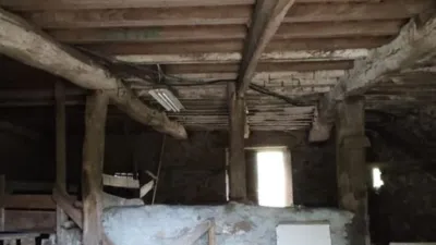 Stone house with 2 floors in Linares, (Brion). The ground floor is used as a cellar or stables. The upper floor has a wood-burning kitchen, living room, dining room, bathroom and bedroom. Uralite roof with iron beams and wooden panels. Very quiet area. It has a granary, cellar and land. 3 km from San Felipe Castle and Cariño beach, and 10 km from Ferrol. Storage room. The sale price does not include taxes (ITP/AJD) nor Notary or Land Registry fees. REQUEST Detailed Information Sheet for the property Note: The information contained in this advertisement is purely informative and indicative, lacking contractual value. Data, areas, features, price and other information may be subject to possible errors, omissions, modifications or withdrawal of the property from the market without prior notice. photo 25