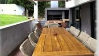 Detached house for sale in Begues, located in the Mas Ferrer area. Plot size: 1,364m² with a built-up area of 364m². Features 5 bedrooms (1 suite with dressing room), 3 bathrooms (2 with double shower and 1 with jacuzzi). Santos kitchen equipped with Neff appliances. Spacious living-dining room with library area and billiard room. Parquet flooring, aluminium windows, heating and air conditioning, reinforced door. Large garden with pool and chill-out area with barbecue. Solar panels included. The property is in very good condition and situated in a quiet location. photo 48
