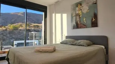 Duplex Penthouse with Dream Views: Infinite Mediterranean Sea Views - Camporosso Village, Finestrat 112 m² interior | 191.51 m² total built-up area | 170.27 m² usable surface 3 bedrooms | 3 bathrooms 82.56 m² of terraces, including a spectacular rooftop solarium of 43.82 m² with jacuzzi Stunning panoramic sea views 1 parking space included Energy Class A - Extremely energy efficient (30 kWh/m²/year) Layout: First Floor (74 m²): Open-plan living-dining room with modern kitchen, 2 bedrooms (master with en-suite bathroom), 2 bathrooms and 16 m² terrace with sea views. Second Floor (29 m²): Spacious third bedroom/multi-purpose room, bathroom, storage room, 16.60 m² terrace, plus an impressive rooftop solarium of 43.82 m² with 180° panoramic sea and Benidorm skyline views! Features: Air conditioning (heating/cooling) | Automatic awnings and electric shutters | Alarm system | Fully equipped modern kitchen | Parking space included | Energy rating A | All furniture included | Complete smart home system controllable via mobile app (electric shutters, all lights, air conditioning, door intercom and more) Community Services: Outdoor and heated swimming pools | Padel court | Gym | Children's playground | Gardens Privileged Location - Calle Colombia 2, Finestrat: 10 min to beaches | Shopping centres and supermarkets | Golf courses | Restaurants | Medical services and schools Perfect for: Families, investors, seekers of Mediterranean lifestyle, permanent or holiday residence, the best of life on the Costa Blanca. A Unique Opportunity: Modern duplex penthouse with A energy certification, huge private rooftop solarium with jacuzzi, smart home technology and all furniture included in one of the most complete urbanisations on the Costa Blanca. photo 25