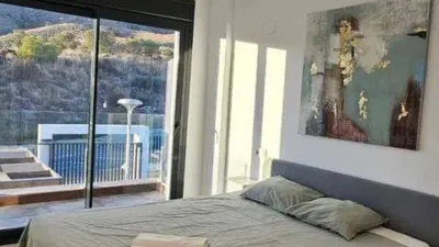Duplex Penthouse with Dream Views: Infinite Mediterranean Sea Views - Camporosso Village, Finestrat 112 m² interior | 191.51 m² total built-up area | 170.27 m² usable surface 3 bedrooms | 3 bathrooms 82.56 m² of terraces, including a spectacular rooftop solarium of 43.82 m² with jacuzzi Stunning panoramic sea views 1 parking space included Energy Class A - Extremely energy efficient (30 kWh/m²/year) Layout: First Floor (74 m²): Open-plan living-dining room with modern kitchen, 2 bedrooms (master with en-suite bathroom), 2 bathrooms and 16 m² terrace with sea views. Second Floor (29 m²): Spacious third bedroom/multi-purpose room, bathroom, storage room, 16.60 m² terrace, plus an impressive rooftop solarium of 43.82 m² with 180° panoramic sea and Benidorm skyline views! Features: Air conditioning (heating/cooling) | Automatic awnings and electric shutters | Alarm system | Fully equipped modern kitchen | Parking space included | Energy rating A | All furniture included | Complete smart home system controllable via mobile app (electric shutters, all lights, air conditioning, door intercom and more) Community Services: Outdoor and heated swimming pools | Padel court | Gym | Children's playground | Gardens Privileged Location - Calle Colombia 2, Finestrat: 10 min to beaches | Shopping centres and supermarkets | Golf courses | Restaurants | Medical services and schools Perfect for: Families, investors, seekers of Mediterranean lifestyle, permanent or holiday residence, the best of life on the Costa Blanca. A Unique Opportunity: Modern duplex penthouse with A energy certification, huge private rooftop solarium with jacuzzi, smart home technology and all furniture included in one of the most complete urbanisations on the Costa Blanca. photo 26