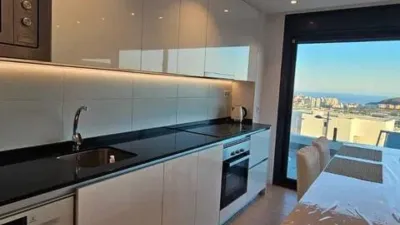 Duplex Penthouse with Dream Views: Infinite Mediterranean Sea Views - Camporosso Village, Finestrat 112 m² interior | 191.51 m² total built-up area | 170.27 m² usable surface 3 bedrooms | 3 bathrooms 82.56 m² of terraces, including a spectacular rooftop solarium of 43.82 m² with jacuzzi Stunning panoramic sea views 1 parking space included Energy Class A - Extremely energy efficient (30 kWh/m²/year) Layout: First Floor (74 m²): Open-plan living-dining room with modern kitchen, 2 bedrooms (master with en-suite bathroom), 2 bathrooms and 16 m² terrace with sea views. Second Floor (29 m²): Spacious third bedroom/multi-purpose room, bathroom, storage room, 16.60 m² terrace, plus an impressive rooftop solarium of 43.82 m² with 180° panoramic sea and Benidorm skyline views! Features: Air conditioning (heating/cooling) | Automatic awnings and electric shutters | Alarm system | Fully equipped modern kitchen | Parking space included | Energy rating A | All furniture included | Complete smart home system controllable via mobile app (electric shutters, all lights, air conditioning, door intercom and more) Community Services: Outdoor and heated swimming pools | Padel court | Gym | Children's playground | Gardens Privileged Location - Calle Colombia 2, Finestrat: 10 min to beaches | Shopping centres and supermarkets | Golf courses | Restaurants | Medical services and schools Perfect for: Families, investors, seekers of Mediterranean lifestyle, permanent or holiday residence, the best of life on the Costa Blanca. A Unique Opportunity: Modern duplex penthouse with A energy certification, huge private rooftop solarium with jacuzzi, smart home technology and all furniture included in one of the most complete urbanisations on the Costa Blanca. photo 16