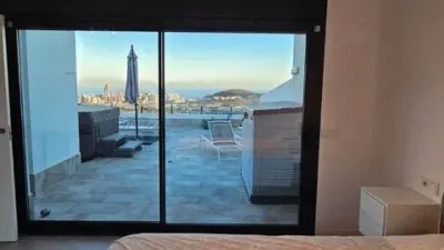 Duplex Penthouse with Dream Views: Infinite Mediterranean Sea Views - Camporosso Village, Finestrat 112 m² interior | 191.51 m² total built-up area | 170.27 m² usable surface 3 bedrooms | 3 bathrooms 82.56 m² of terraces, including a spectacular rooftop solarium of 43.82 m² with jacuzzi Stunning panoramic sea views 1 parking space included Energy Class A - Extremely energy efficient (30 kWh/m²/year) Layout: First Floor (74 m²): Open-plan living-dining room with modern kitchen, 2 bedrooms (master with en-suite bathroom), 2 bathrooms and 16 m² terrace with sea views. Second Floor (29 m²): Spacious third bedroom/multi-purpose room, bathroom, storage room, 16.60 m² terrace, plus an impressive rooftop solarium of 43.82 m² with 180° panoramic sea and Benidorm skyline views! Features: Air conditioning (heating/cooling) | Automatic awnings and electric shutters | Alarm system | Fully equipped modern kitchen | Parking space included | Energy rating A | All furniture included | Complete smart home system controllable via mobile app (electric shutters, all lights, air conditioning, door intercom and more) Community Services: Outdoor and heated swimming pools | Padel court | Gym | Children's playground | Gardens Privileged Location - Calle Colombia 2, Finestrat: 10 min to beaches | Shopping centres and supermarkets | Golf courses | Restaurants | Medical services and schools Perfect for: Families, investors, seekers of Mediterranean lifestyle, permanent or holiday residence, the best of life on the Costa Blanca. A Unique Opportunity: Modern duplex penthouse with A energy certification, huge private rooftop solarium with jacuzzi, smart home technology and all furniture included in one of the most complete urbanisations on the Costa Blanca. photo 40