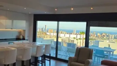 Duplex Penthouse with Dream Views: Infinite Mediterranean Sea Views - Camporosso Village, Finestrat 112 m² interior | 191.51 m² total built-up area | 170.27 m² usable surface 3 bedrooms | 3 bathrooms 82.56 m² of terraces, including a spectacular rooftop solarium of 43.82 m² with jacuzzi Stunning panoramic sea views 1 parking space included Energy Class A - Extremely energy efficient (30 kWh/m²/year) Layout: First Floor (74 m²): Open-plan living-dining room with modern kitchen, 2 bedrooms (master with en-suite bathroom), 2 bathrooms and 16 m² terrace with sea views. Second Floor (29 m²): Spacious third bedroom/multi-purpose room, bathroom, storage room, 16.60 m² terrace, plus an impressive rooftop solarium of 43.82 m² with 180° panoramic sea and Benidorm skyline views! Features: Air conditioning (heating/cooling) | Automatic awnings and electric shutters | Alarm system | Fully equipped modern kitchen | Parking space included | Energy rating A | All furniture included | Complete smart home system controllable via mobile app (electric shutters, all lights, air conditioning, door intercom and more) Community Services: Outdoor and heated swimming pools | Padel court | Gym | Children's playground | Gardens Privileged Location - Calle Colombia 2, Finestrat: 10 min to beaches | Shopping centres and supermarkets | Golf courses | Restaurants | Medical services and schools Perfect for: Families, investors, seekers of Mediterranean lifestyle, permanent or holiday residence, the best of life on the Costa Blanca. A Unique Opportunity: Modern duplex penthouse with A energy certification, huge private rooftop solarium with jacuzzi, smart home technology and all furniture included in one of the most complete urbanisations on the Costa Blanca. photo 18