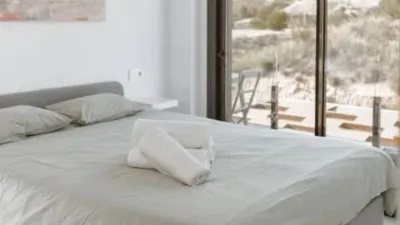 Duplex Penthouse with Dream Views: Infinite Mediterranean Sea Views - Camporosso Village, Finestrat 112 m² interior | 191.51 m² total built-up area | 170.27 m² usable surface 3 bedrooms | 3 bathrooms 82.56 m² of terraces, including a spectacular rooftop solarium of 43.82 m² with jacuzzi Stunning panoramic sea views 1 parking space included Energy Class A - Extremely energy efficient (30 kWh/m²/year) Layout: First Floor (74 m²): Open-plan living-dining room with modern kitchen, 2 bedrooms (master with en-suite bathroom), 2 bathrooms and 16 m² terrace with sea views. Second Floor (29 m²): Spacious third bedroom/multi-purpose room, bathroom, storage room, 16.60 m² terrace, plus an impressive rooftop solarium of 43.82 m² with 180° panoramic sea and Benidorm skyline views! Features: Air conditioning (heating/cooling) | Automatic awnings and electric shutters | Alarm system | Fully equipped modern kitchen | Parking space included | Energy rating A | All furniture included | Complete smart home system controllable via mobile app (electric shutters, all lights, air conditioning, door intercom and more) Community Services: Outdoor and heated swimming pools | Padel court | Gym | Children's playground | Gardens Privileged Location - Calle Colombia 2, Finestrat: 10 min to beaches | Shopping centres and supermarkets | Golf courses | Restaurants | Medical services and schools Perfect for: Families, investors, seekers of Mediterranean lifestyle, permanent or holiday residence, the best of life on the Costa Blanca. A Unique Opportunity: Modern duplex penthouse with A energy certification, huge private rooftop solarium with jacuzzi, smart home technology and all furniture included in one of the most complete urbanisations on the Costa Blanca. photo 84