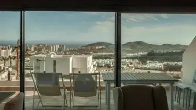 Duplex Penthouse with Dream Views: Infinite Mediterranean Sea Views - Camporosso Village, Finestrat 112 m² interior | 191.51 m² total built-up area | 170.27 m² usable surface 3 bedrooms | 3 bathrooms 82.56 m² of terraces, including a spectacular rooftop solarium of 43.82 m² with jacuzzi Stunning panoramic sea views 1 parking space included Energy Class A - Extremely energy efficient (30 kWh/m²/year) Layout: First Floor (74 m²): Open-plan living-dining room with modern kitchen, 2 bedrooms (master with en-suite bathroom), 2 bathrooms and 16 m² terrace with sea views. Second Floor (29 m²): Spacious third bedroom/multi-purpose room, bathroom, storage room, 16.60 m² terrace, plus an impressive rooftop solarium of 43.82 m² with 180° panoramic sea and Benidorm skyline views! Features: Air conditioning (heating/cooling) | Automatic awnings and electric shutters | Alarm system | Fully equipped modern kitchen | Parking space included | Energy rating A | All furniture included | Complete smart home system controllable via mobile app (electric shutters, all lights, air conditioning, door intercom and more) Community Services: Outdoor and heated swimming pools | Padel court | Gym | Children's playground | Gardens Privileged Location - Calle Colombia 2, Finestrat: 10 min to beaches | Shopping centres and supermarkets | Golf courses | Restaurants | Medical services and schools Perfect for: Families, investors, seekers of Mediterranean lifestyle, permanent or holiday residence, the best of life on the Costa Blanca. A Unique Opportunity: Modern duplex penthouse with A energy certification, huge private rooftop solarium with jacuzzi, smart home technology and all furniture included in one of the most complete urbanisations on the Costa Blanca. photo 116