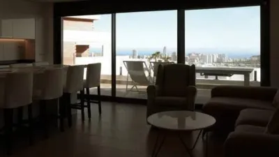 Duplex Penthouse with Dream Views: Infinite Mediterranean Sea Views - Camporosso Village, Finestrat 112 m² interior | 191.51 m² total built-up area | 170.27 m² usable surface 3 bedrooms | 3 bathrooms 82.56 m² of terraces, including a spectacular rooftop solarium of 43.82 m² with jacuzzi Stunning panoramic sea views 1 parking space included Energy Class A - Extremely energy efficient (30 kWh/m²/year) Layout: First Floor (74 m²): Open-plan living-dining room with modern kitchen, 2 bedrooms (master with en-suite bathroom), 2 bathrooms and 16 m² terrace with sea views. Second Floor (29 m²): Spacious third bedroom/multi-purpose room, bathroom, storage room, 16.60 m² terrace, plus an impressive rooftop solarium of 43.82 m² with 180° panoramic sea and Benidorm skyline views! Features: Air conditioning (heating/cooling) | Automatic awnings and electric shutters | Alarm system | Fully equipped modern kitchen | Parking space included | Energy rating A | All furniture included | Complete smart home system controllable via mobile app (electric shutters, all lights, air conditioning, door intercom and more) Community Services: Outdoor and heated swimming pools | Padel court | Gym | Children's playground | Gardens Privileged Location - Calle Colombia 2, Finestrat: 10 min to beaches | Shopping centres and supermarkets | Golf courses | Restaurants | Medical services and schools Perfect for: Families, investors, seekers of Mediterranean lifestyle, permanent or holiday residence, the best of life on the Costa Blanca. A Unique Opportunity: Modern duplex penthouse with A energy certification, huge private rooftop solarium with jacuzzi, smart home technology and all furniture included in one of the most complete urbanisations on the Costa Blanca. photo 103