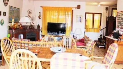 Semi-detached house in the Almijara urbanization, Nerja, with sea views. The property comprises a living room, kitchen, shower room, private patio, and a terrace on the ground floor. Three bedrooms and one bathroom on the first floor. There is also a basement converted into a small study. Parking and communal pool included. Sea views. photo 3