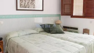 Semi-detached house in the Almijara urbanization, Nerja, with sea views. The property comprises a living room, kitchen, shower room, private patio, and a terrace on the ground floor. Three bedrooms and one bathroom on the first floor. There is also a basement converted into a small study. Parking and communal pool included. Sea views. photo 14