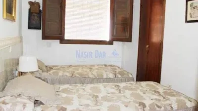 Semi-detached house in the Almijara urbanization, Nerja, with sea views. The property comprises a living room, kitchen, shower room, private patio, and a terrace on the ground floor. Three bedrooms and one bathroom on the first floor. There is also a basement converted into a small study. Parking and communal pool included. Sea views. photo 13