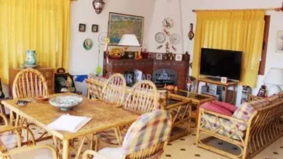 Semi-detached house in the Almijara urbanization, Nerja, with sea views. The property comprises a living room, kitchen, shower room, private patio, and a terrace on the ground floor. Three bedrooms and one bathroom on the first floor. There is also a basement converted into a small study. Parking and communal pool included. Sea views. photo 5