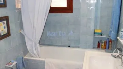 Semi-detached house in the Almijara urbanization, Nerja, with sea views. The property comprises a living room, kitchen, shower room, private patio, and a terrace on the ground floor. Three bedrooms and one bathroom on the first floor. There is also a basement converted into a small study. Parking and communal pool included. Sea views. photo 8