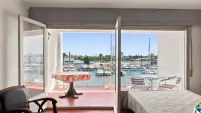 Apartment with cabin and 8 m² terrace for sale in the Nausica building, Port Grec Sector, Empuriabrava. Discover this bright apartment with a cabin located in one of the most attractive areas of Empuriabrava, offering spectacular views over the main canal. The property features an open-plan kitchen integrated into a spacious living-dining room, creating a comfortable and functional space with direct access to a magnificent terrace where you can enjoy privileged views and pleasant outdoor moments. It also includes a full bathroom and a practical cabin that provides additional space with multiple usage possibilities. The property requires renovation, making it an excellent opportunity to customize it to your taste and increase its value, whether as a holiday home, investment, or primary residence. Don’t miss out on this opportunity. Visit it and discover all the potential this unique property in Empuriabrava has to offer. [IW]. photo 9