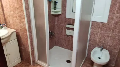 Ground floor flat with patio for sale in Figueres. The property comprises 100 m2, featuring 3 bedrooms, 1 full bathroom, a dining-living room with a fireplace, and an independent kitchen. The building includes a patio of approximately 100 m2[IW] photo 10