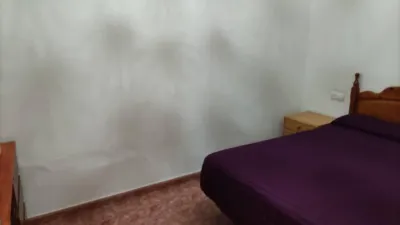 Ground floor flat with patio for sale in Figueres. The property comprises 100 m2, featuring 3 bedrooms, 1 full bathroom, a dining-living room with a fireplace, and an independent kitchen. The building includes a patio of approximately 100 m2[IW] photo 12