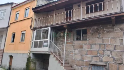 Stone house with land in the riverbank area. Stone house distributed as follows: basement with cellar, old shop and wood store; first floor with kitchen, bathroom, gallery and bedroom; second floor with 2 bedrooms, bathroom, and attic space with balcony access. Land and orchards located 100 metres away. Option to sell separately – house for €35,000 and land for €8,000. Located 1.5 km from Ribadavia and 11 km from Carballiño. Well connected and situated. Surrounded by hiking routes, thermal areas, etc., just a few km from Nautico. Don’t miss out on seeing it. Don’t lose the opportunity to visit this gem and fall in love with its potential. Contact us or visit our office at C/ Progreso 123, 1st floor, office 2, Ourense (Vila Rejo building). Make this place your new home! photo 2