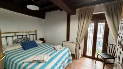 Chalet en Casas del Castañar photo 11