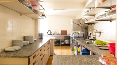 Hotel for sale in A Estrada, located on one of the routes of the Camino de Santiago. It comprises 16 bedrooms, 10 with private bathrooms and 6 with two shared bathrooms. Additionally, it features two spacious halls of 250 m² and 120 m², perfect for events, celebrations or catering. On the first floor are the reception, lounge, bar, café, terrace and a fully equipped industrial kitchen. The ground floor houses the laundry room, wine cellar, cold storage rooms and a storage area. The hotel is fitted with solar panels for hot water and a 10,000-litre diesel tank, ensuring energy efficiency and autonomy. Its excellent location, functionality and capacity make it a unique investment opportunity in tourism in one of the most visited areas of Galicia. For more information, contact us at INMOPONTE PEREGRINA 63 PONTEVEDRA photo 8
