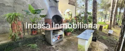 Chalet for sale in Los Pinos de Valverde del Camino, in a beautiful area surrounded by nature. The property features a spacious living room with a fireplace, three double bedrooms, a bathroom with a shower tray, a kitchen with access to the barbecue area, a front terrace, a swimming pool, and a large plot with olive trees, fruit trees, a chicken coop, and a spacious garage. photo 15